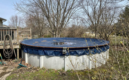 Spring opening turns a covered above ground pool into a swim-ready backyard