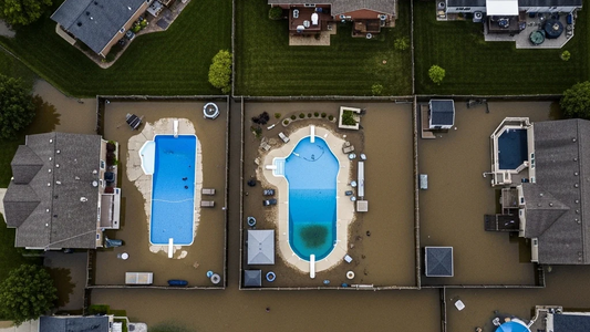 Iowa Pool Owners' Crisis Guide: Battling Flooding, Nitrates, and Climate Extremes in 2025