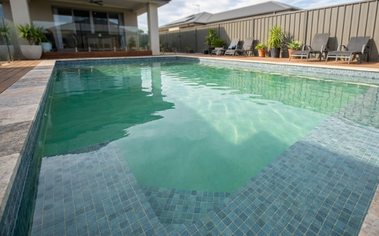 Swimming pool with clear but greenish water caused by copper, not algae